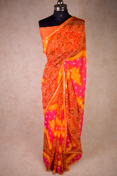 Georgette bandhani saree in pink orange - KANHASAREE