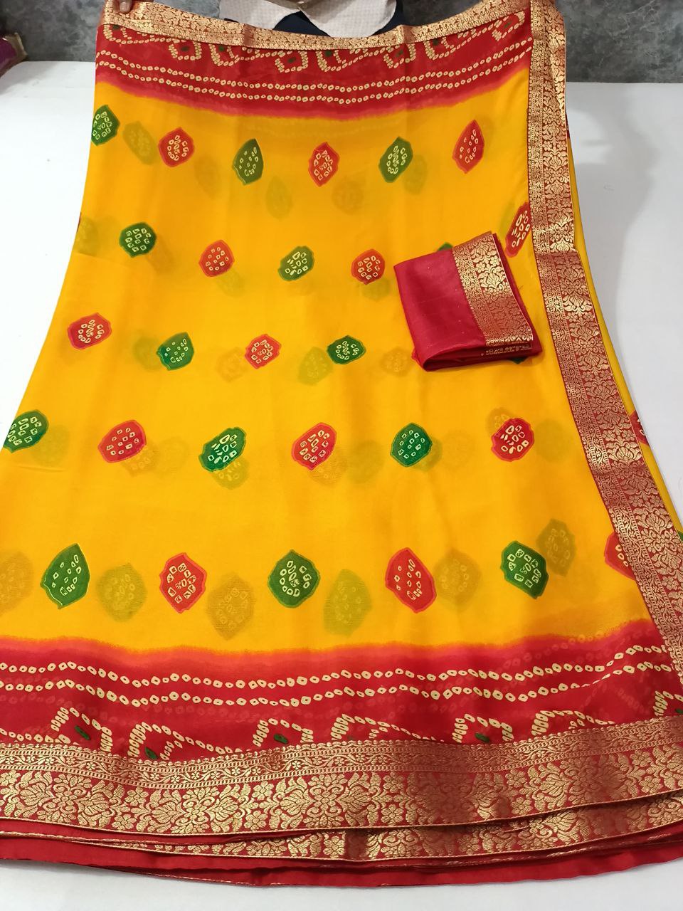 Georgette Bandhani Piliya Saree with Banarasi Weaving Border – Ethnic Elegance for Festive Occasions