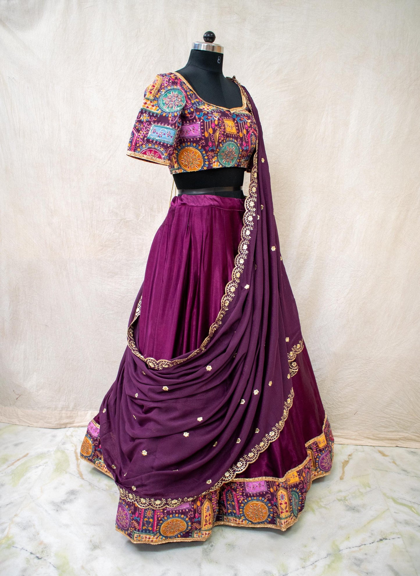 embroidered net dupatta with scalloped border in matching purple and gold