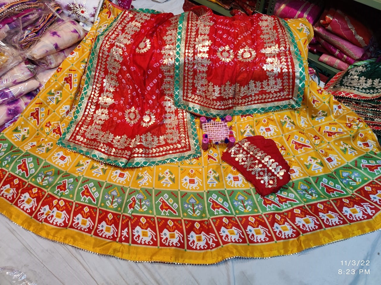 Patola Print Lehenga Choli Dupatta Set in Dola Silk with Gota Patti Work - KANHASAREE