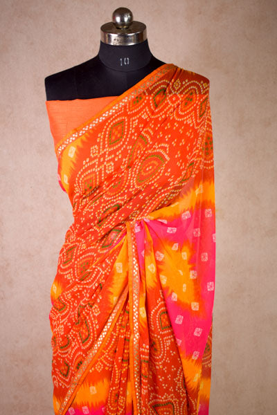 Georgette bandhani saree in pink orange - KANHASAREE