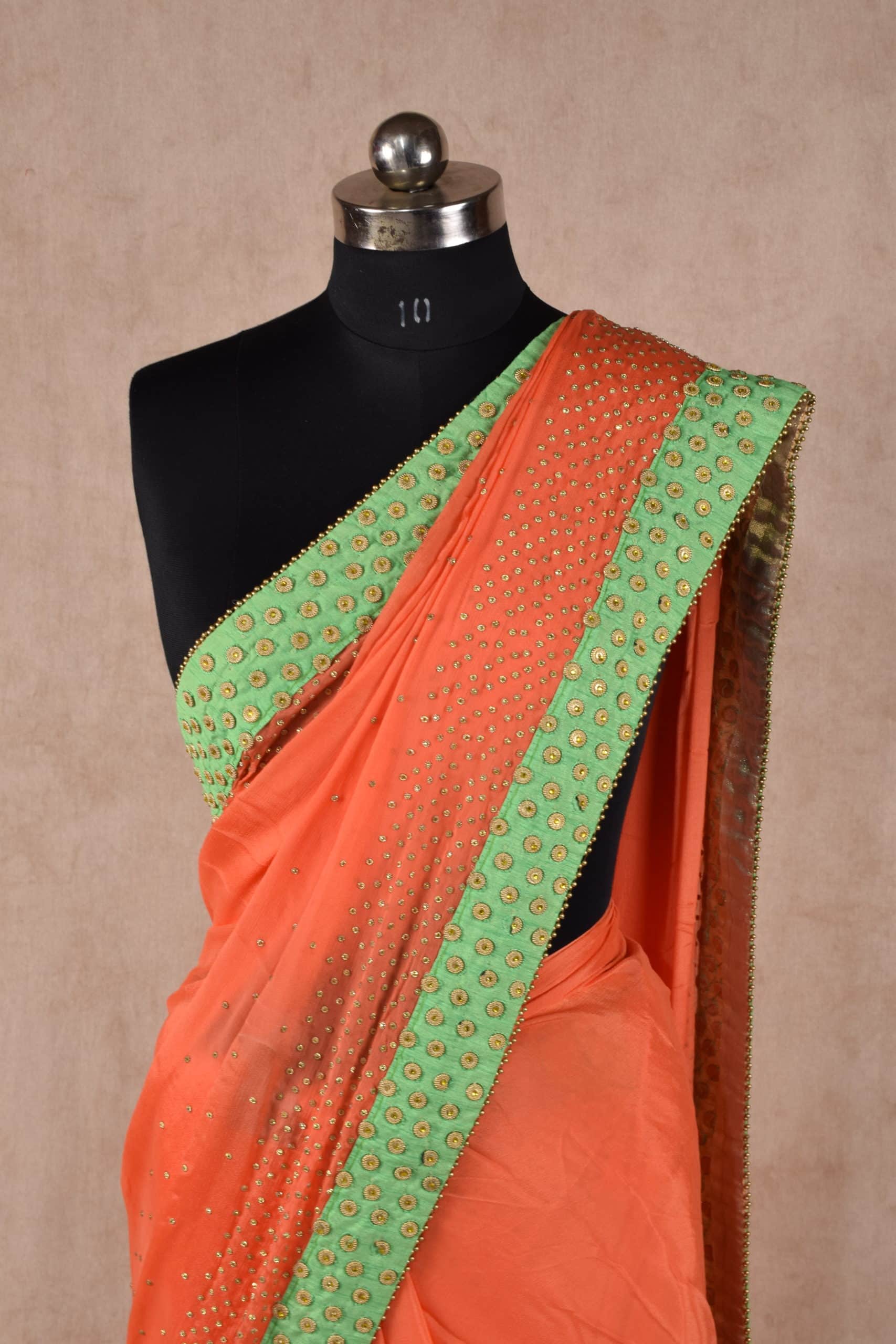 Elegant Peach Color saree embellished with stone work and raw silk border - KANHASAREE