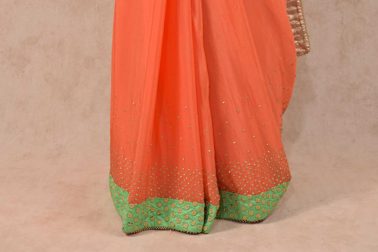 Elegant Peach Color saree embellished with stone work and raw silk border - KANHASAREE