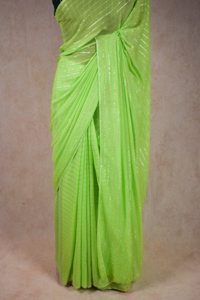 Pure georgette zari line saree in green colour - KANHASAREE