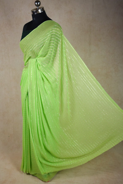 Pure georgette zari line saree in green colour - KANHASAREE