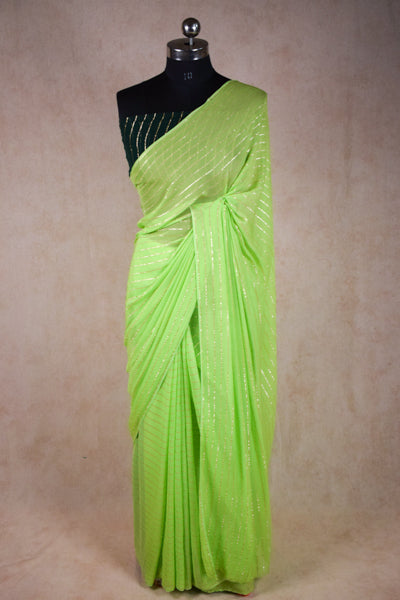 Pure georgette zari line saree in green colour - KANHASAREE