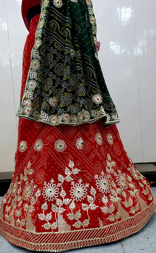 Rajasthani chunri lehenga in red colour gotapatti lehenga
