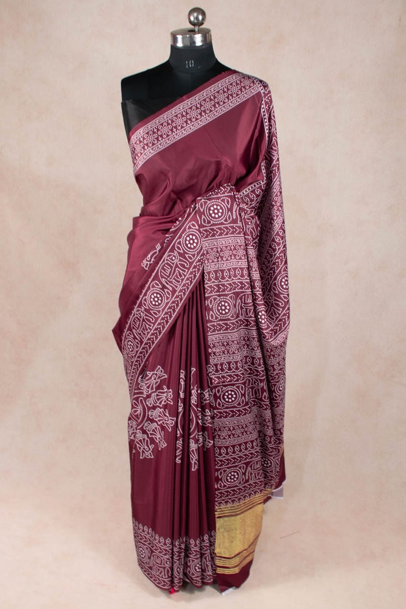 Dazzling Dola Silk Bandhani Saree with Golden Patta - KANHASAREE