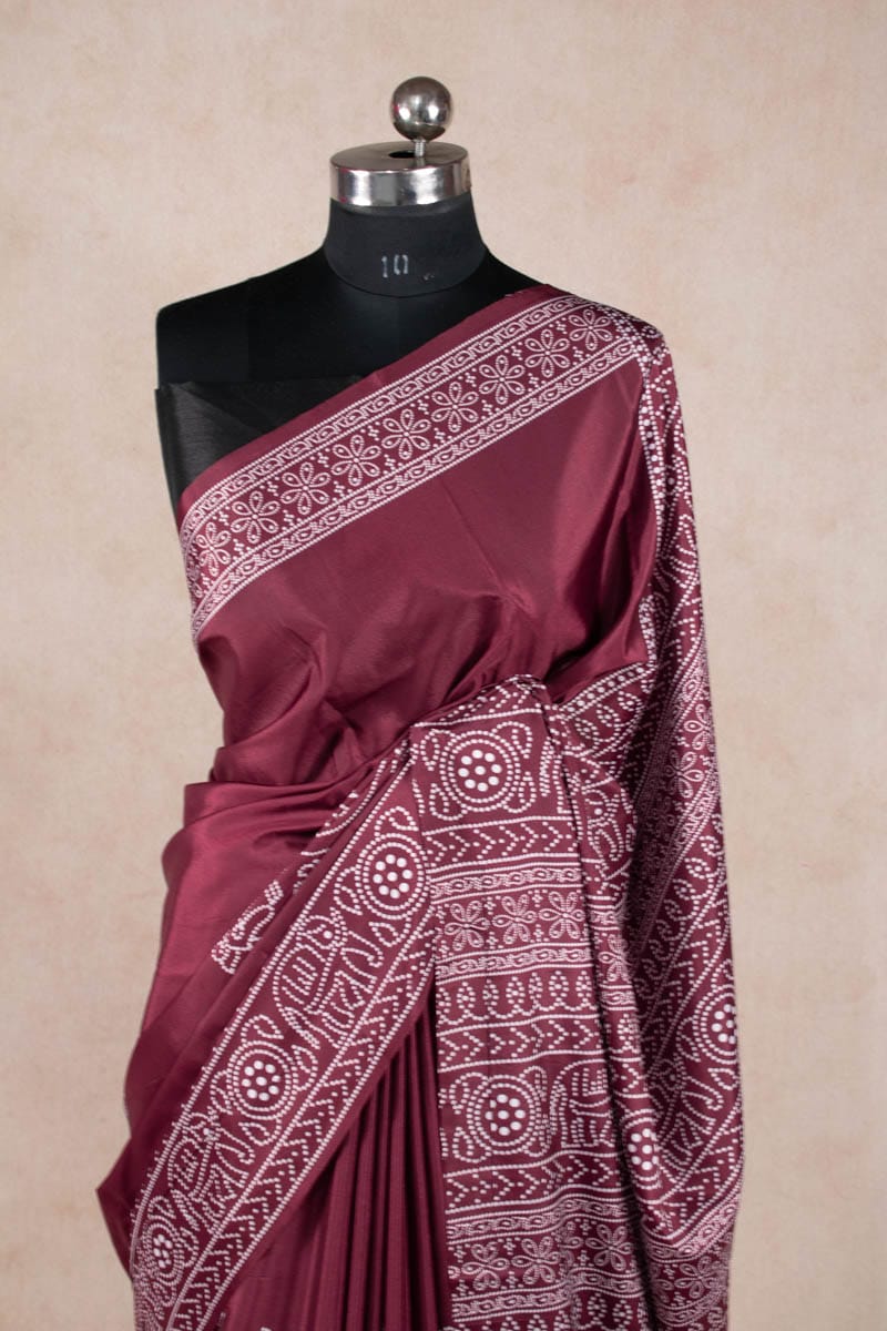 Dazzling Dola Silk Bandhani Saree with Golden Patta - KANHASAREE