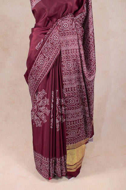 Dazzling Dola Silk Bandhani Saree with Golden Patta - KANHASAREE