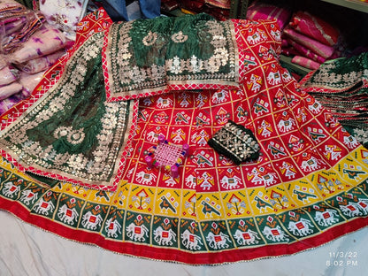 Patola Print Lehenga Choli Dupatta Set in Dola Silk with Gota Patti Work - KANHASAREE