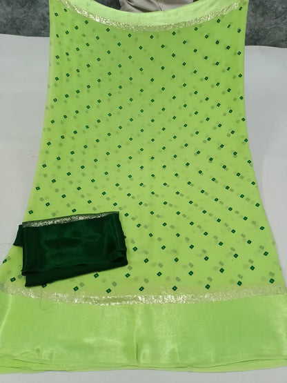 Pure Georgette Bandhani Print Saree with Satin Border & Contrast Green Blouse