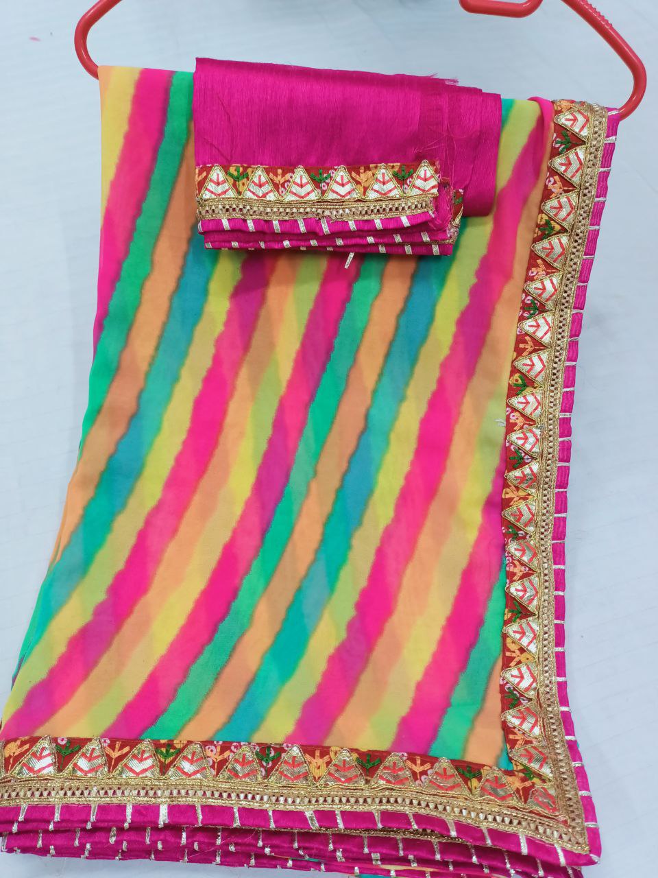 Multi-Color Georgette Leheriya Saree with Rani Color Dupion Silk Blouse