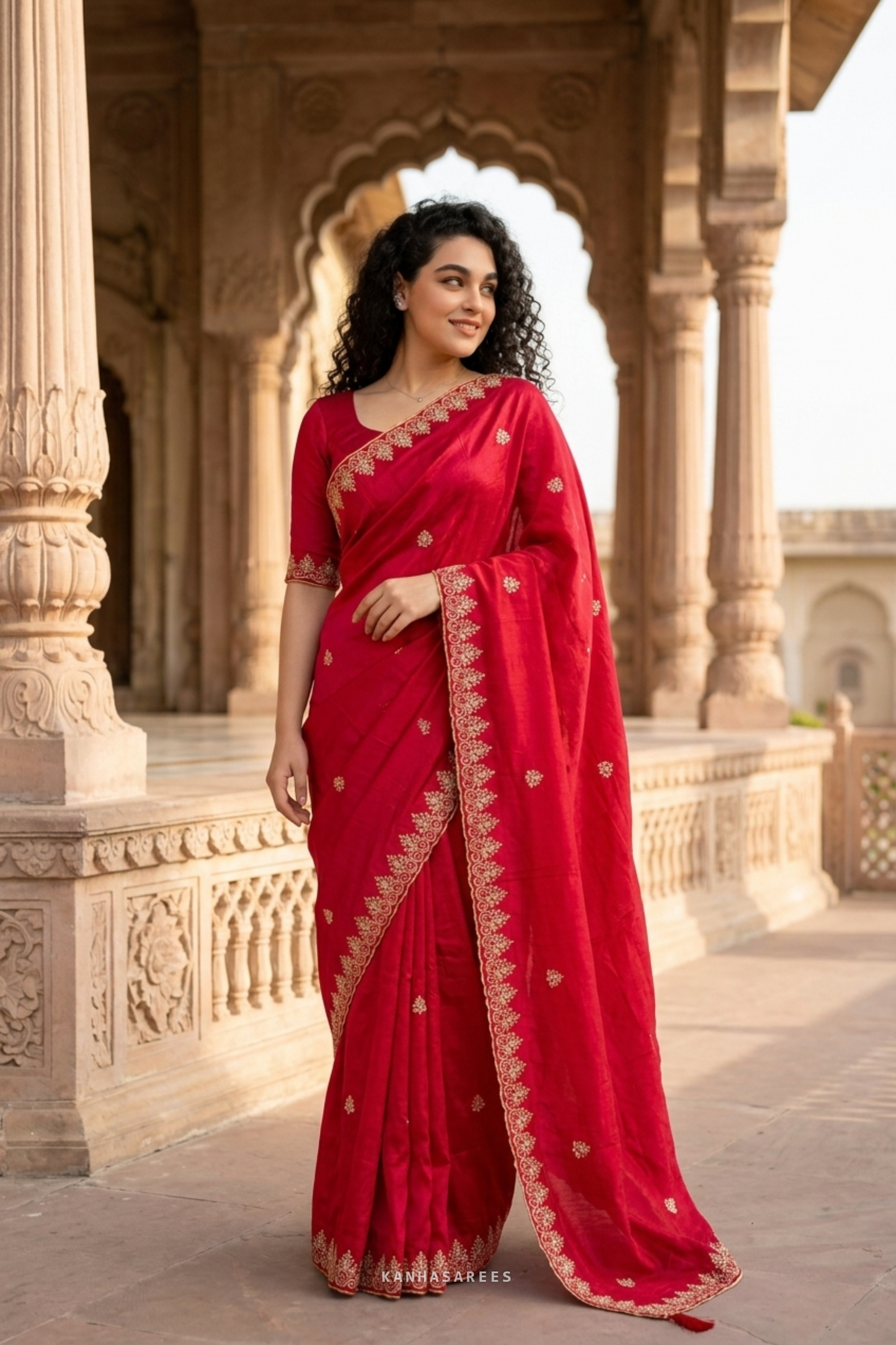 Traditional red art silk saree with intricate Jaipuri weave.