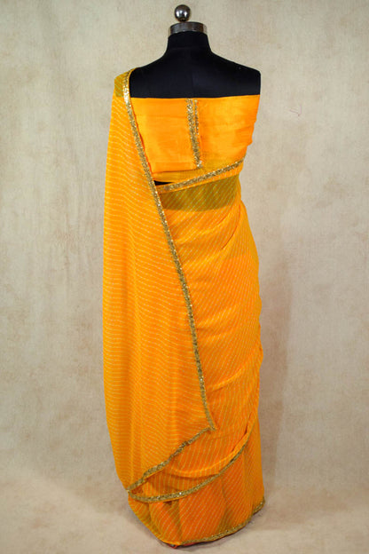 yellow leheriya saree with sequence border - KANHASAREE